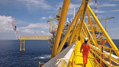 worker on rig at sea