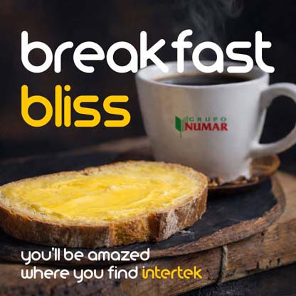 A cup of coffee with the Numar brand next to some buttered toast