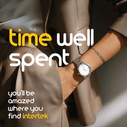 An elegant wristwatch worn by a woman with her hand in her pants pocket